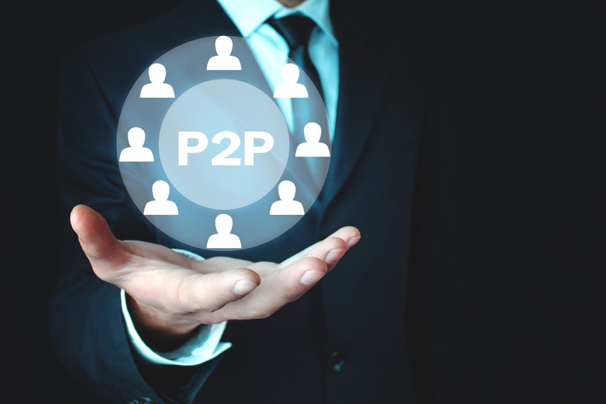 Man holding P2P word with people icon. Concept of peer to peer P2P